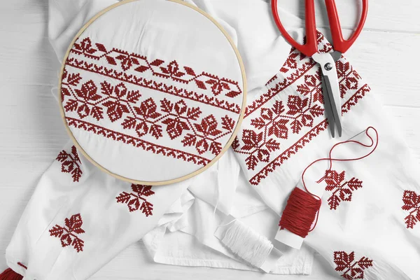 Shirt Red Embroidery Design Hoop Scissors Thread White Wooden Table — Fotografia de Stock