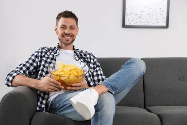 Handsome Man Eating Potato Chips Sofa Home — Photo