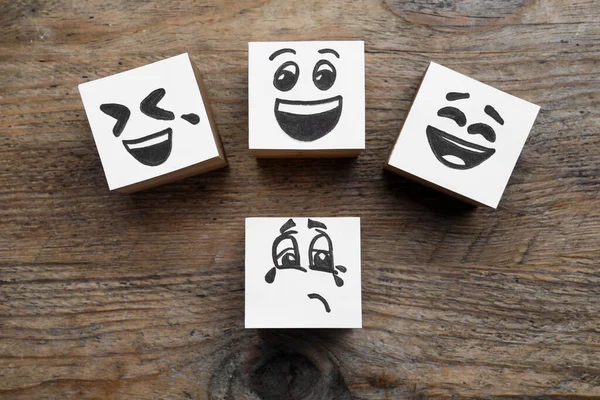 Cubes Sad Funny Faces Wooden Table Flat Lay Bullying Concept — Stock fotografie