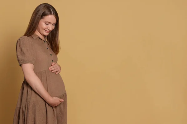 Happy Young Pregnant Woman Light Brown Background Space Text — Stockfoto