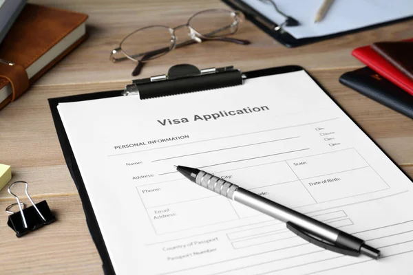 Visa Application Form Immigration Stationery Wooden Table Closeup — Foto Stock