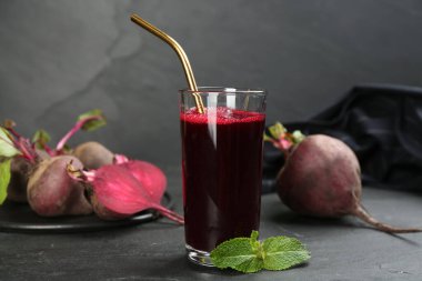 Freshly made beet juice on black table