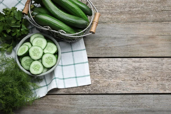 Fresh Ripe Cucumbers Greens Wooden Table Flat Lay Space Text — Stockfoto