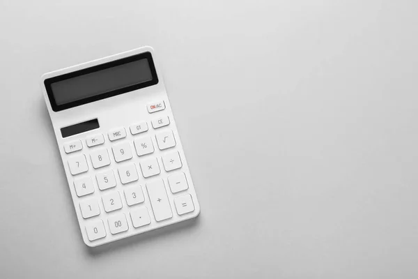 White Calculator Light Background Top View Space Text — Stock Fotó