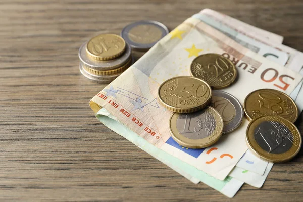 Euro Banknotes Coins Wooden Table Closeup — Stockfoto