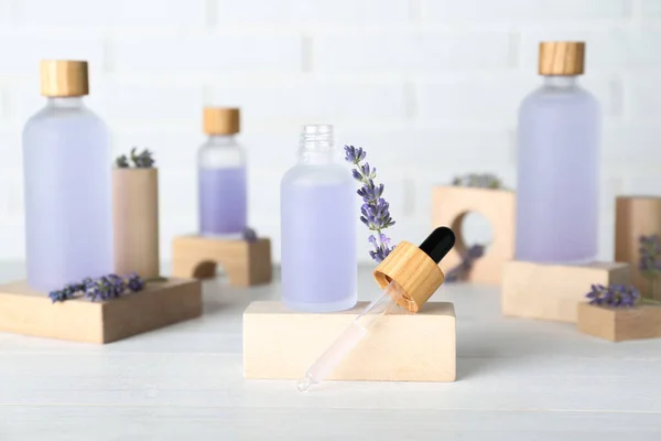 Bottles Lavender Essential Oil Flowers Wooden Table — Stock fotografie