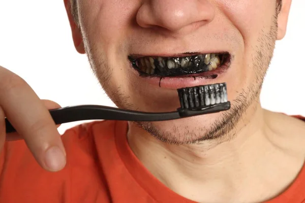 Man Brushing Teeth Charcoal Toothpaste White Background Closeup — 스톡 사진