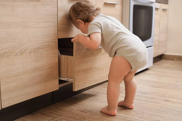 Little Child Exploring Drawer Kitchen Dangerous Situation — 스톡 사진