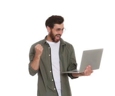 Happy handsome man with laptop on white background