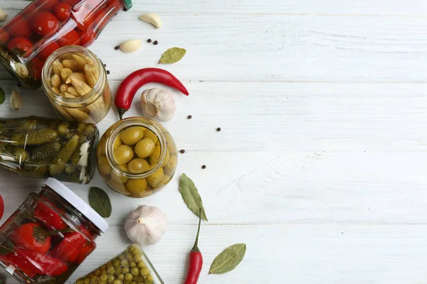 Glass Jars Different Pickled Vegetables White Wooden Background Flat Lay — Stok fotoğraf