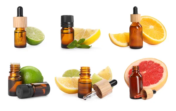 Set Bottles Different Citrus Essential Oils Fresh Fruits White Background — Stock Fotó