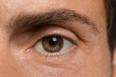 Handsome adult man as background, closeup of eye
