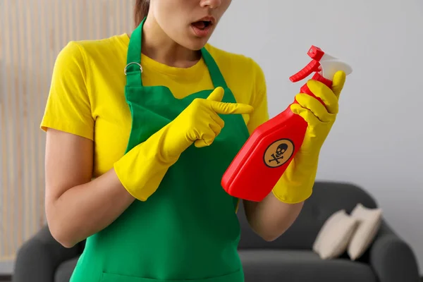 Woman Pointing Bottle Toxic Household Chemical Warning Sign Closeup — Stok fotoğraf