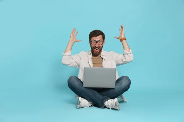 Emotional Man Laptop Light Blue Background — Foto de Stock