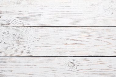 Arkaplan olarak beyaz ahşap yüzey dokusu, üst görünüm