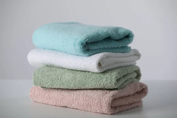 Stack Folded Soft Colorful Towels White Table — Fotografia de Stock
