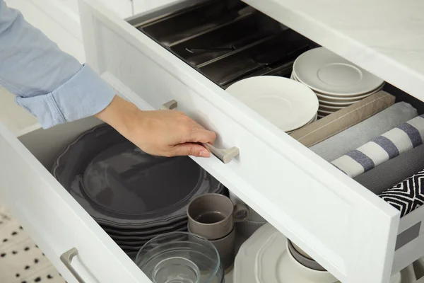 Woman Opening Drawer Kitchen Cabinet Different Dishware Towels Closeup — 스톡 사진
