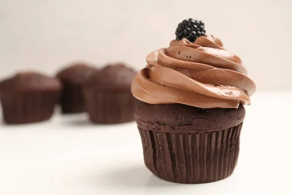 Delicious Chocolate Cupcake Cream Blackberry White Table Closeup Space Text — Stock Photo, Image