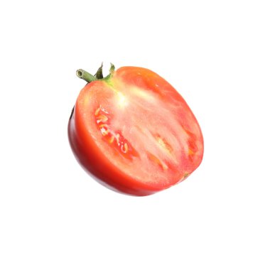 Half of ripe red tomato on white background