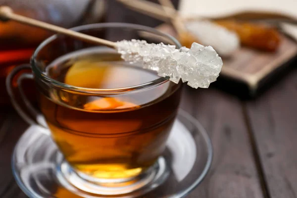 Stick Sugar Crystals Cup Tea Wooden Table Closeup — Stock Fotó
