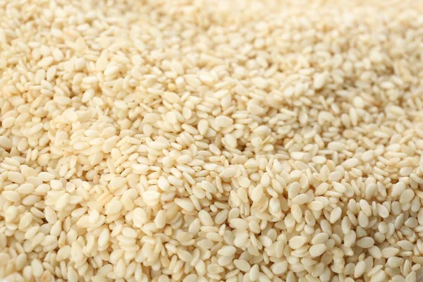 Pile White Sesame Seeds Background Closeup — Stok fotoğraf