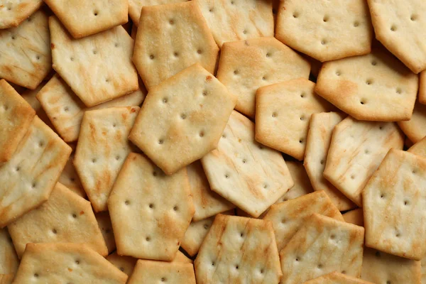 Many Delicious Crackers Background Top View — Stock Photo, Image