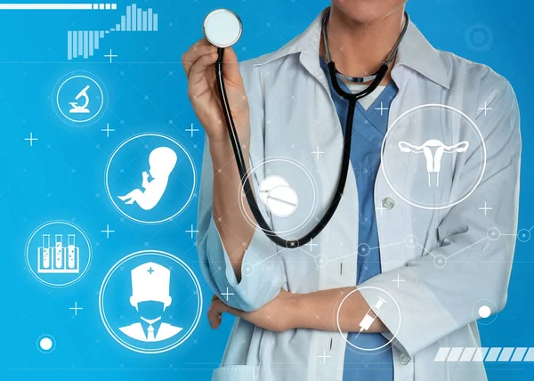 Doctor Stethoscope Different Virtual Icons Blue Background Reproductive Medicine Concept —  Fotos de Stock