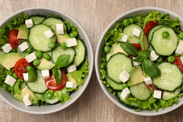 Tasty Fresh Salad Cucumber Bowls Wooden Table Flat Lay — Stockfoto