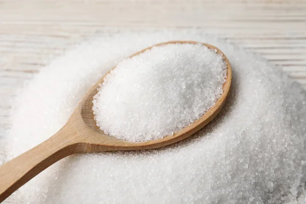 Spoon Granulated Sugar White Wooden Table Closeup —  Fotos de Stock