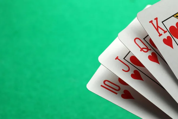 Hand Playing Cards Green Background Closeup Space Text — Foto de Stock