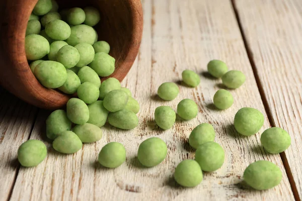 Tasty Wasabi Coated Peanuts White Wooden Table Closeup — Stockfoto