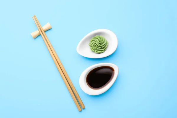 Swirl Wasabi Paste Soy Sauce Chopsticks Light Blue Background Flat — Stockfoto