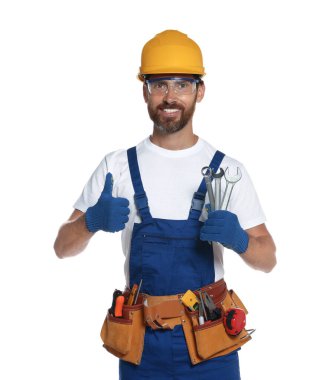 Professional builder in uniform with tool belt isolated on white