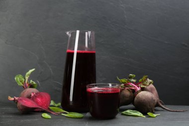 Freshly made beet juice on black table