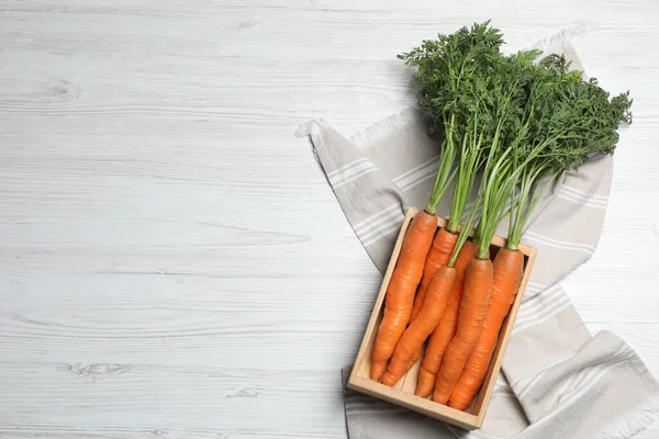 Fresh Carrots Crate White Wooden Table Top View Space Text — Stok Foto
