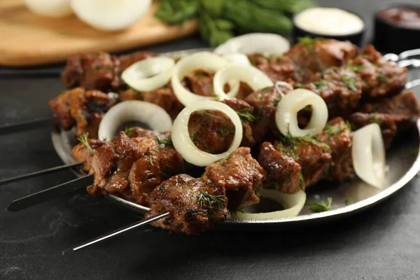 Metal Skewers Delicious Meat Onion Served Black Table Closeup — Foto Stock