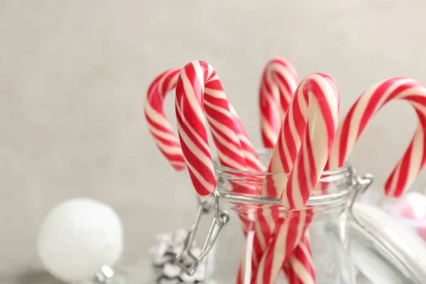 Many Sweet Candy Canes Glass Jar Closeup Traditional Christmas Treat — 스톡 사진