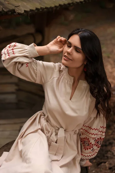 Beautiful Woman Wearing Embroidered Dress Sitting Old Wooden Well Countryside — Stock Fotó