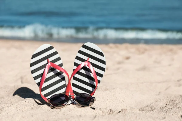 Striped Flip Flops Sunglasses Sandy Beach Sea Space Text — Foto de Stock