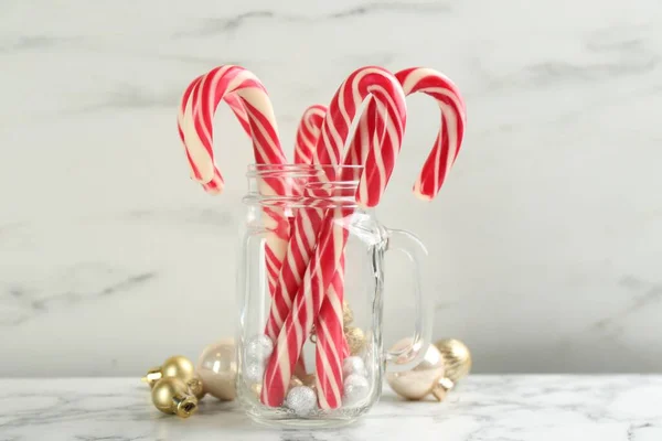 Candy Canes Mason Jar Christmas Balls White Marble Table — Stockfoto