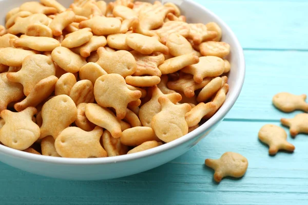 Delicious Goldfish Crackers Bowl Light Blue Wooden Table Closeup — 图库照片