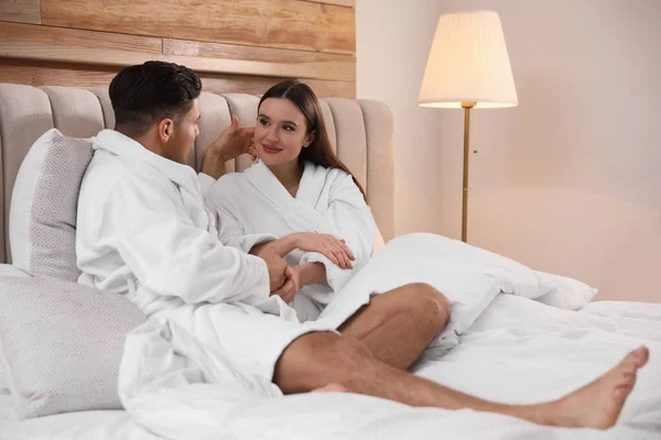 Happy Couple Bathrobes Resting Bed Home — Stock Photo, Image