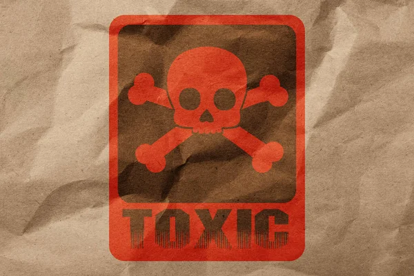 Hazard Warning Sign Skull Crossbones Symbol Word Toxic Crumpled Kraft — Stockfoto