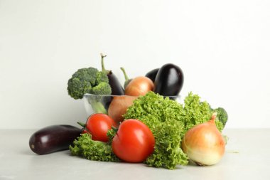 Different fresh vegetables on table. Food poisoning concept