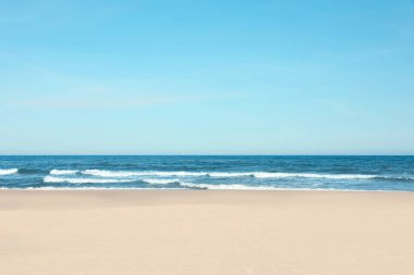 Picturesque view of beautiful sea and sandy beach on sunny day