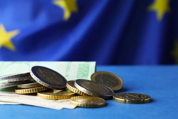Coins Banknotes Blue Table European Union Flag Closeup Space Text — Stockfoto