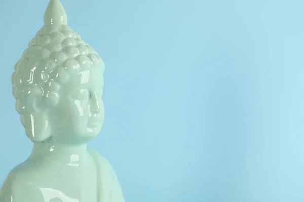 Beautiful Ceramic Buddha Sculpture Light Blue Background Space Text — Stok fotoğraf