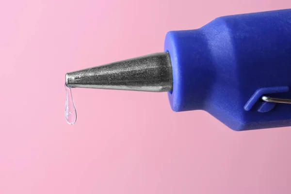Dripping Hot Glue Gun Pink Background Closeup — Stock Fotó