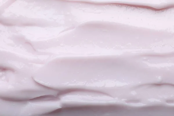 Vista Vicino Della Crema Corpo Rosa Chiaro Come Sfondo — Foto Stock