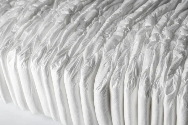 Many Disposable Diapers White Background Closeup View —  Fotos de Stock